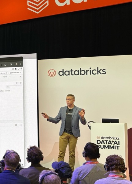 James speaking at a conference